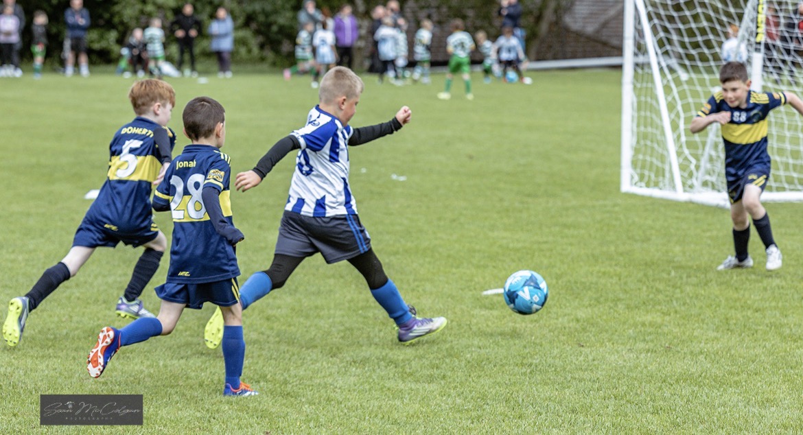 Culmore striker shooting on goal