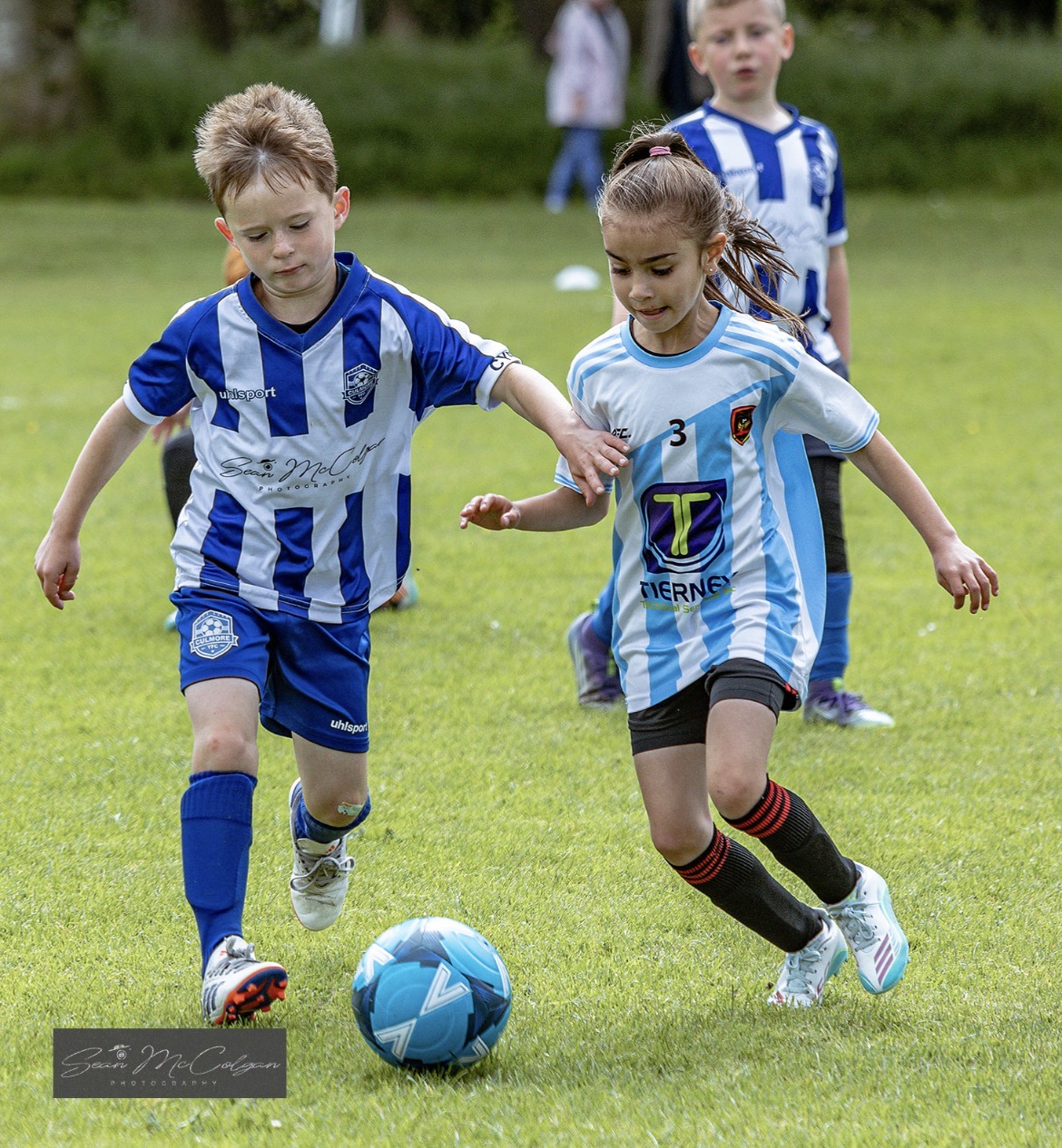 Culmore player dribbling past an opponent